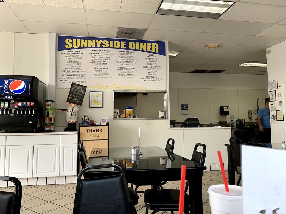 Quiet interior with classic diner seating.