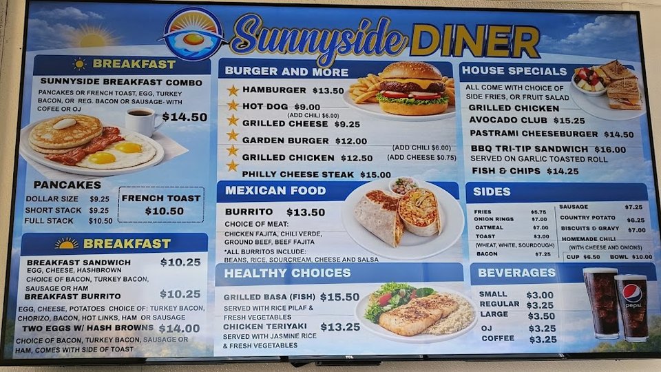 Menu board with breakfast and lunch items.